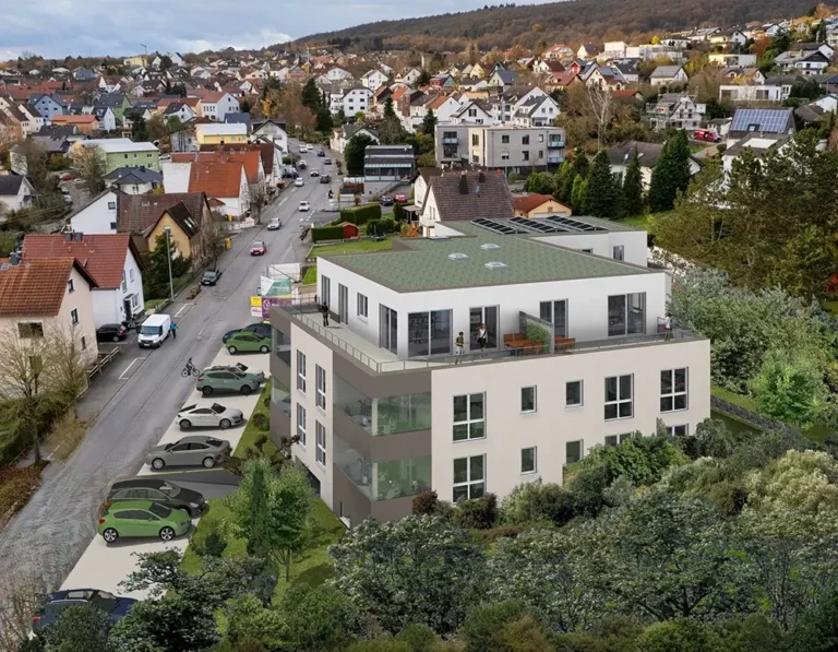 Visualisierung des geplanten Mehrfamilienhauses mit Weiler im Hintergrund